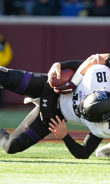Northwestern stays in stride with 24-14 win at Minnesota